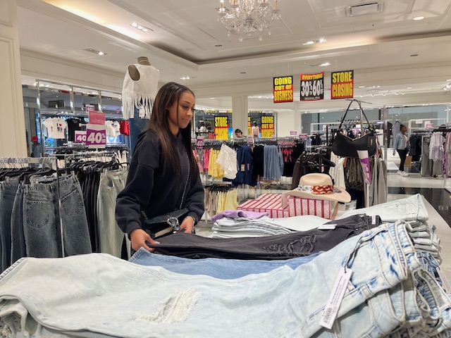 pile of jeans on sale as the Forever 21 liquidation sale at Cherry Hill Mall